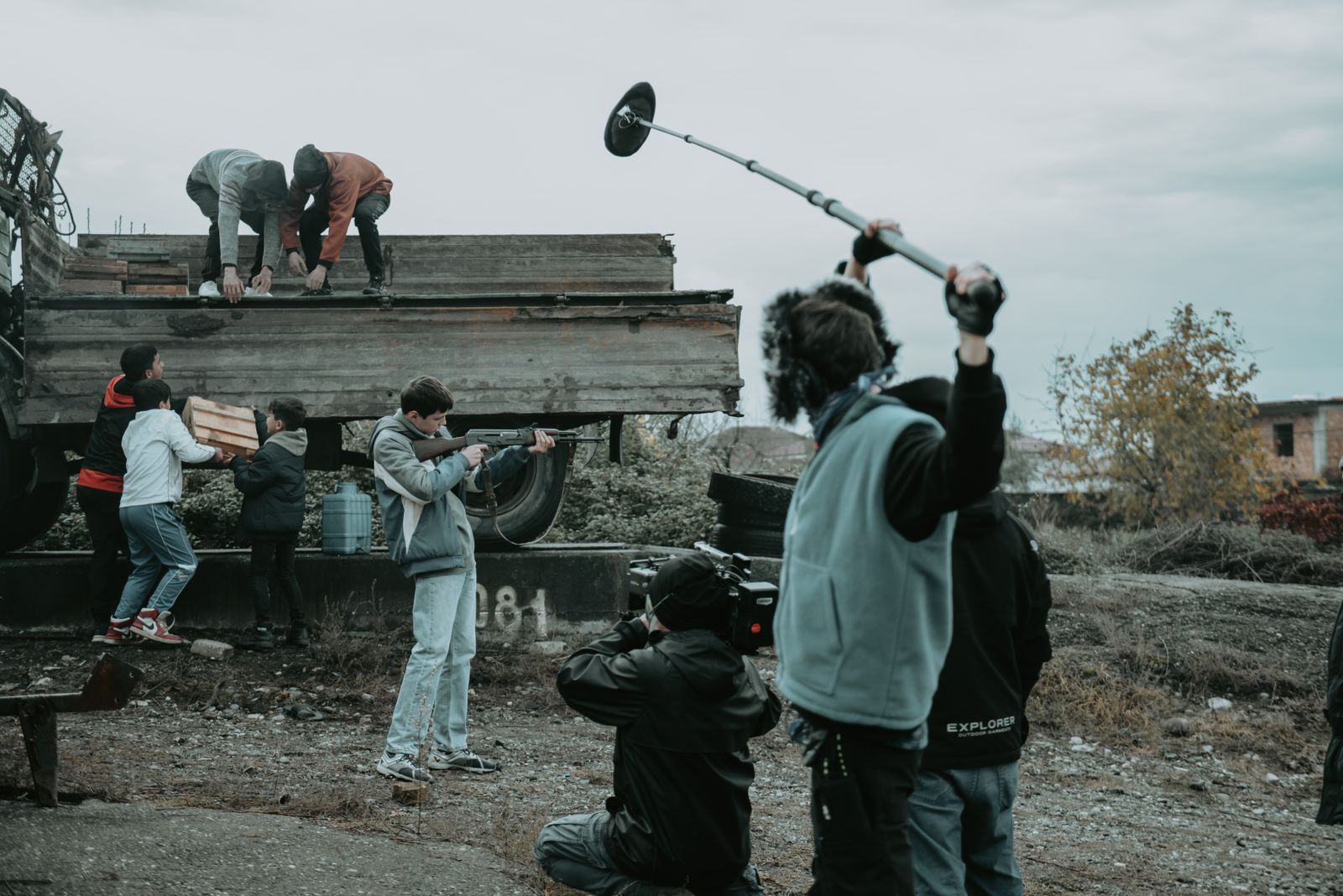 Production crew coordinating a shoot outdoors